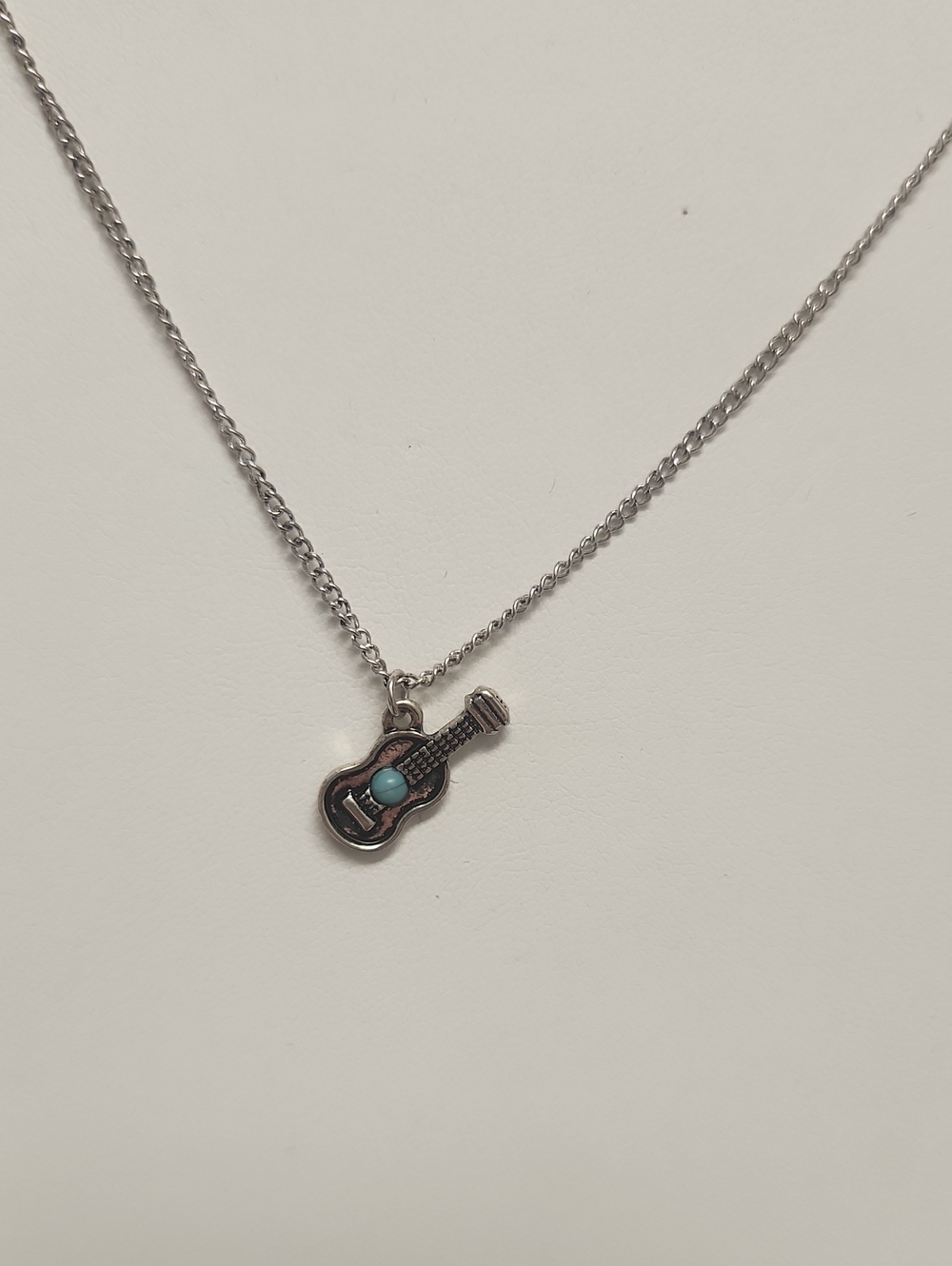 Silver Guitar Pendant Necklace with Turquoise Accent